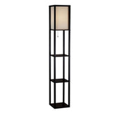 A tall black shelf featuring a lamp positioned on its top surface.